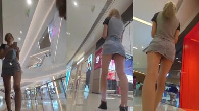 商城跟随偷窥漂亮牛仔裙小姐姐 撅着屁屁穿着白色小内内走路一摆一摆好快